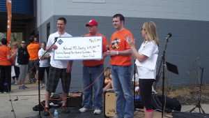 Jim receiving donation